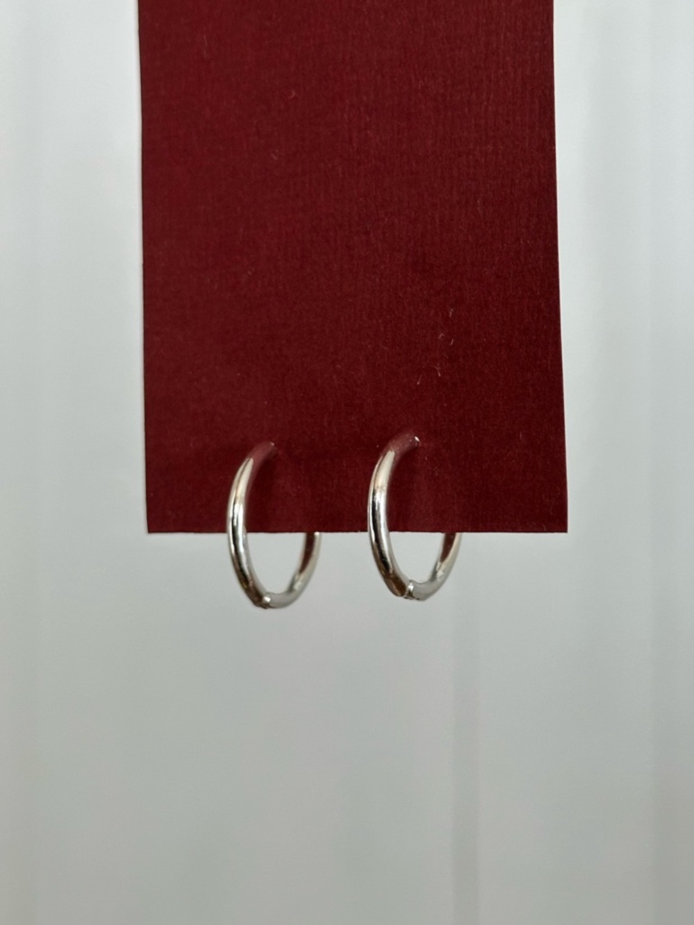 14 mm silver tone hoop earrings